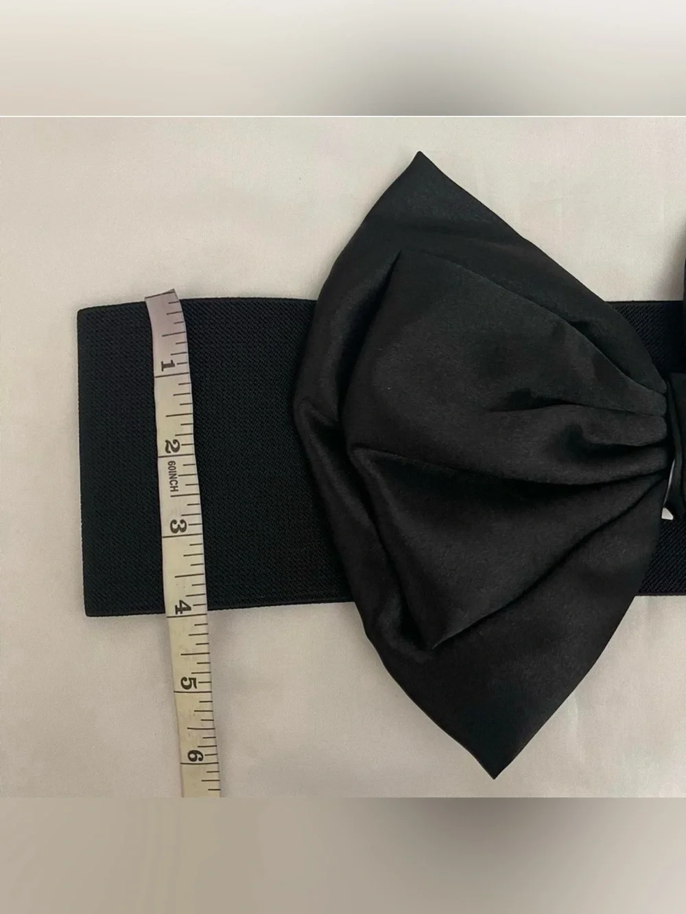 Black wide elastic waistband belt with black satin bow